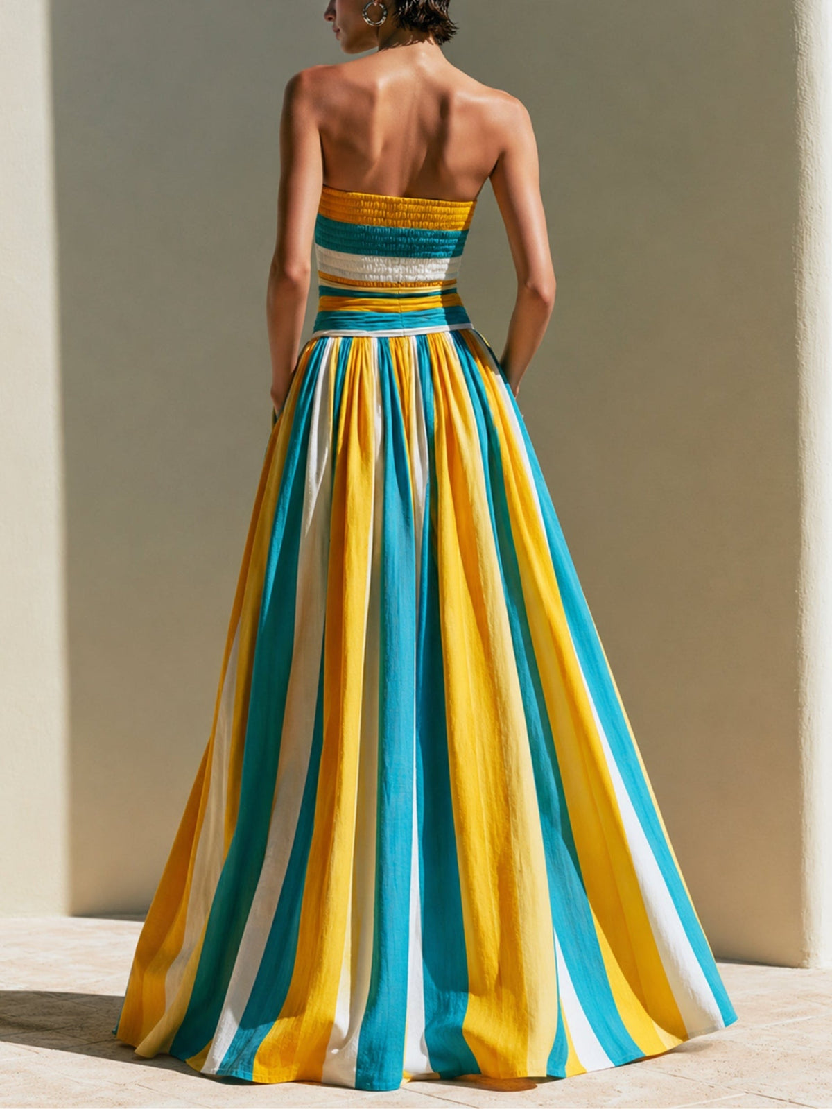 Yellow and blue striped smocked strapless maxi dress